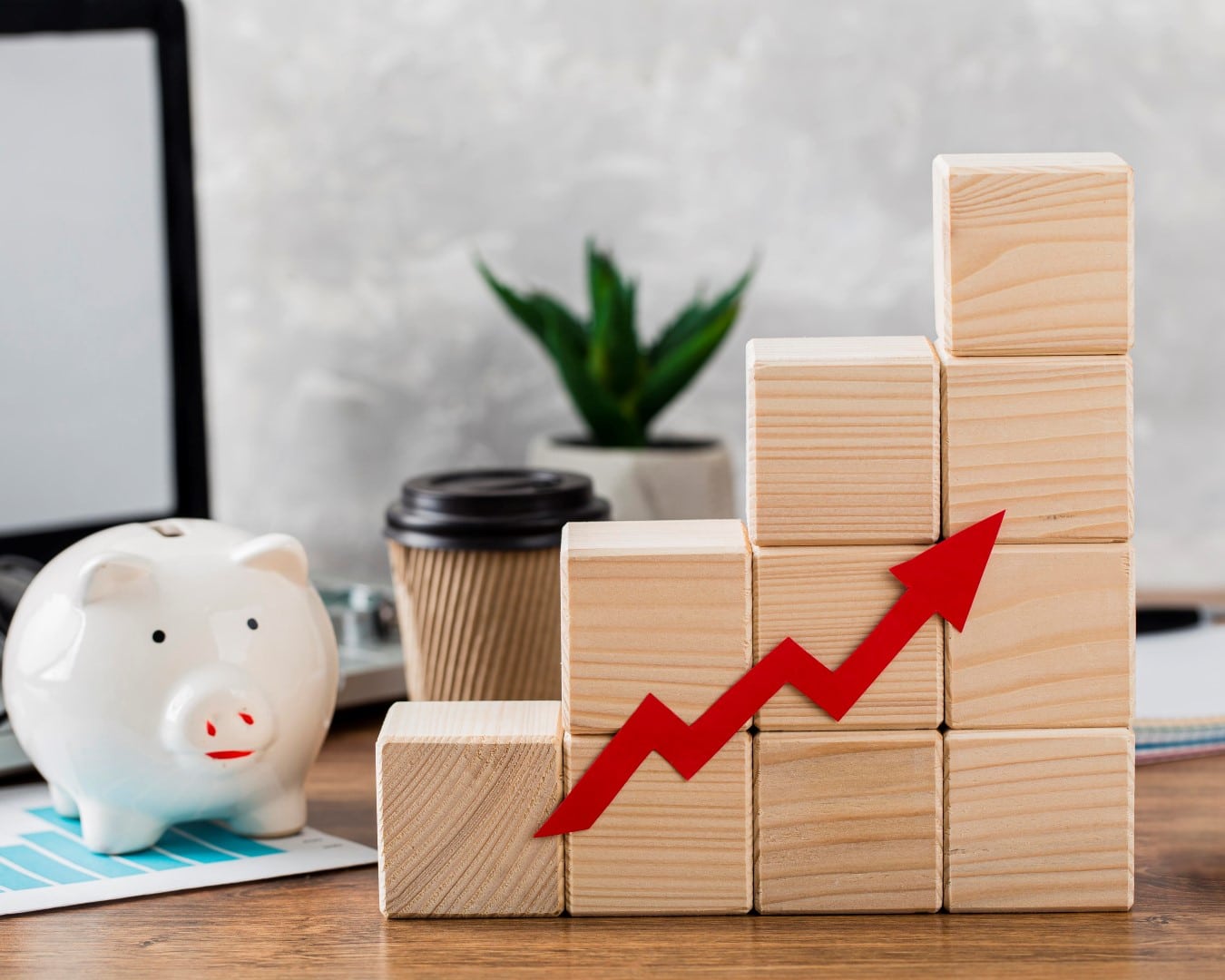 piggy bank with wooden growth blocks.jpg